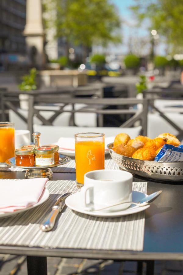 Hotel De La Cigogne Женева Экстерьер фото Breakfast at the hotel