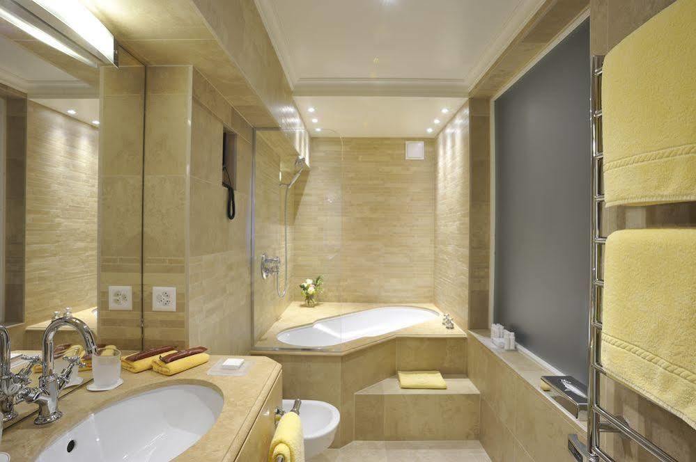 Hotel De La Cigogne Женева Экстерьер фото Bathroom