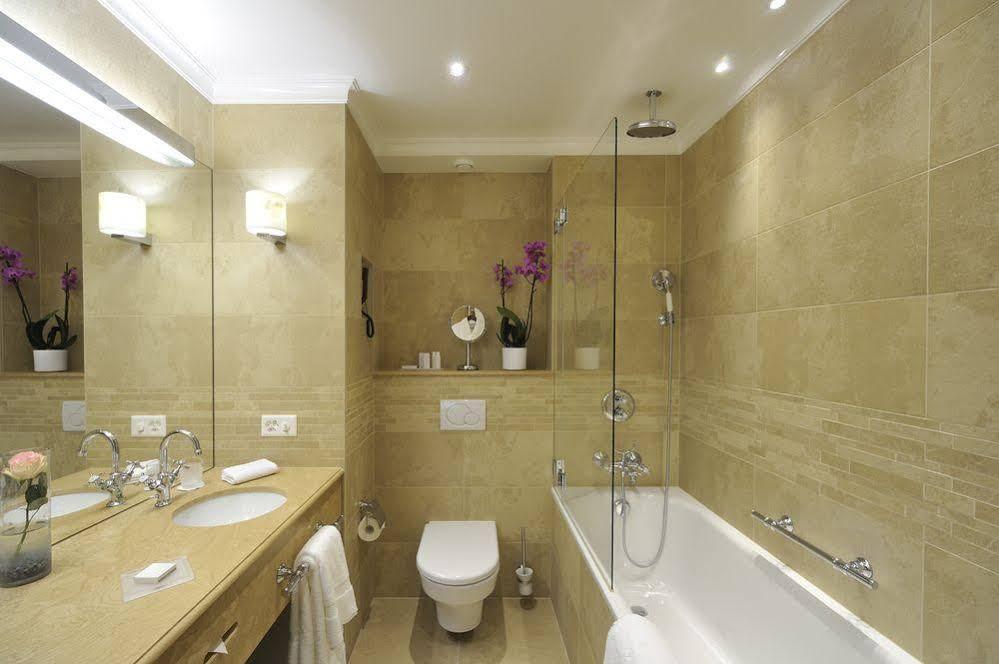 Hotel De La Cigogne Женева Экстерьер фото Bathroom
